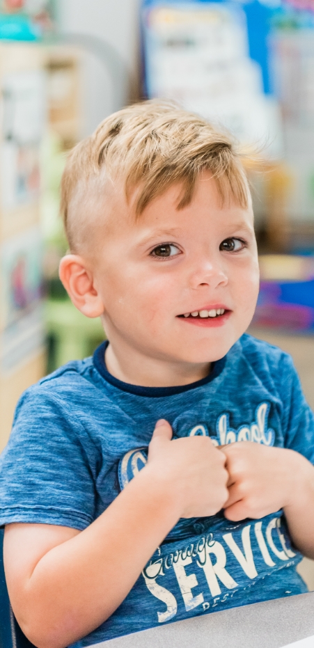 Boy with blue shirt